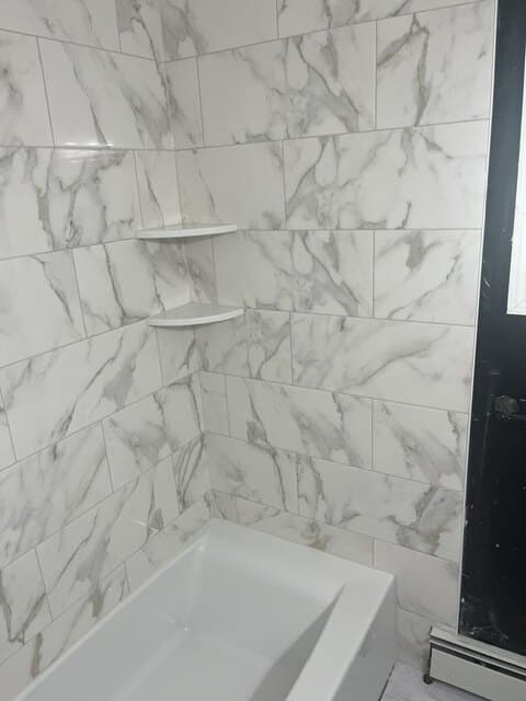 After photo 2 — Calacatta Tub & Shower Surround tile project by JL Tile & Stone, NJ