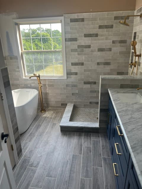 Brushed Gold & Marble Primary Bath — Bathroom tile work by JL Tile & Stone in Morganville, NJ