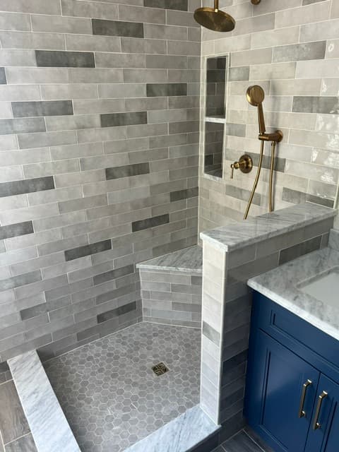 Brushed Gold & Marble Primary Bath — tile and stone work photo 2 by JL Tile & Stone, New Jersey