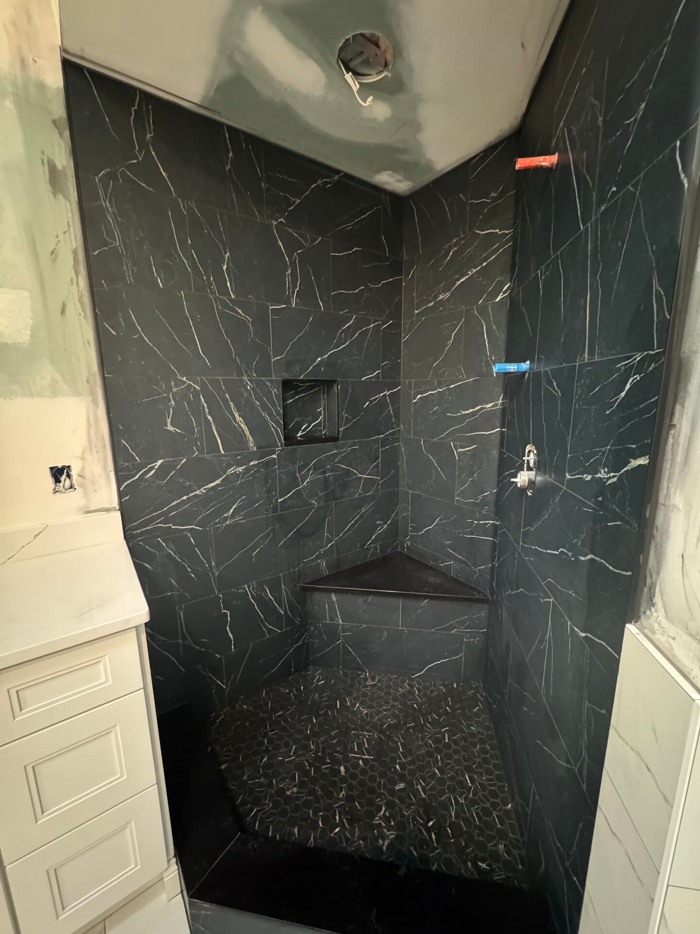Dark Porcelain Shower Build — Bathroom tile project in South Amboy, NJ by JL Tile & Stone