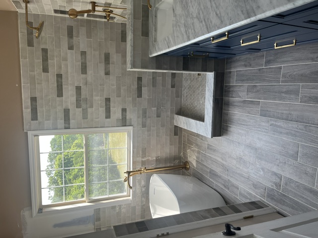 Brushed Gold & Marble Primary Bath — Bathroom tile work in Morganville, NJ by JL Tile & Stone